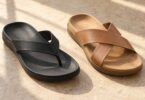 Generic black toe-post sandal and tan cross-strap slide on a neutral floor.