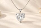 A generic single heart-cut gemstone pendant on a chain.