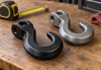 Generic unattached metal recovery hooks on a workshop bench.