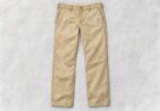 Unbranded full-length khaki trousers laid flat with both straight-cut legs and waistband visible.