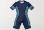 A generic navy and teal short-sleeved one-piece bicycle racing skinsuit.