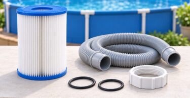 Unbranded pool hoses, seals and a pleated filter cartridge on a workbench.