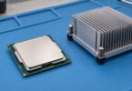 Generic unbranded desktop processor beside a heatsink.