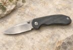 Illustration of an unbranded open folding pocketknife with a charcoal handle and satin-metal blade.