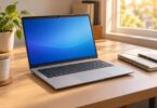 A generic silver compact laptop on a desk.