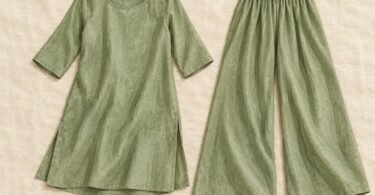 Illustration of a sage green tunic top and matching wide-leg palazzo trousers laid flat.