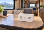 Generic uninstalled alarm on an RV dinette table, shown as an editorial illustration.