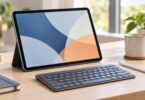 A generic unbranded tablet on a stand beside a detached keyboard and stylus.