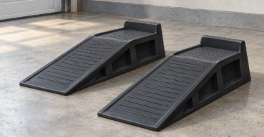 Illustration of two empty low-rise wheel ramps on a level garage floor.