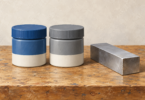 Illustration of two closed generic adhesive containers beside a separate rectangular metal offcut.
