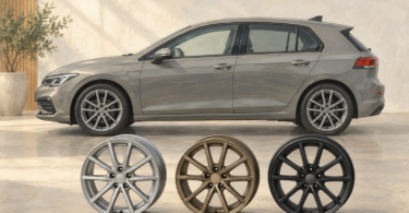Illustration of silver, bronze and black wheels beside a generic grey car.