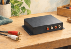 Illustration of a generic audio signal-processing unit with separate RCA cables.