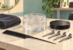 Illustration of styling gel, a tail comb and sectioning clips for loc care
