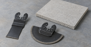 Illustration of detached oscillating-tool blades beside a small uncut cement-board sample.