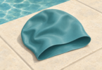 Illustration of a roomy unbranded silicone swimming cap on a clean poolside surface.