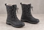 Pair of unbranded charcoal winter boots with quilted shafts and lace-up fronts