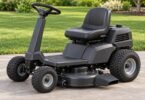 Illustration of a generic compact rear-engine riding mower parked on level concrete.
