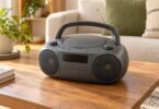 Illustration of generic unbranded portable radio CD player with a carry handle on a wooden table