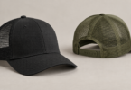 Illustration of black and olive mesh-back trucker hats with adjustable closures