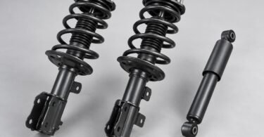 Illustration of generic unbranded suspension strut assemblies and a separate damper.