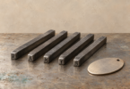 Illustration of unused metal letter punches beside a blank metal tag.