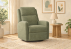 Illustration of an empty sage-green adult glider chair beside a wooden table and lamp.
